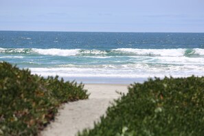 On the beach, sun loungers, beach towels