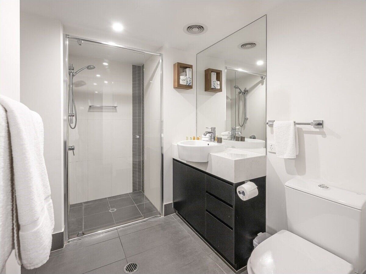 Shower, towels, soap, toilet paper