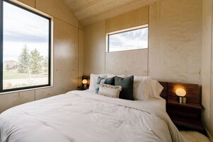 1 bedroom, premium bedding, down comforters, individually decorated