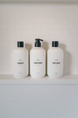 Shower, designer toiletries, hair dryer, bathrobes