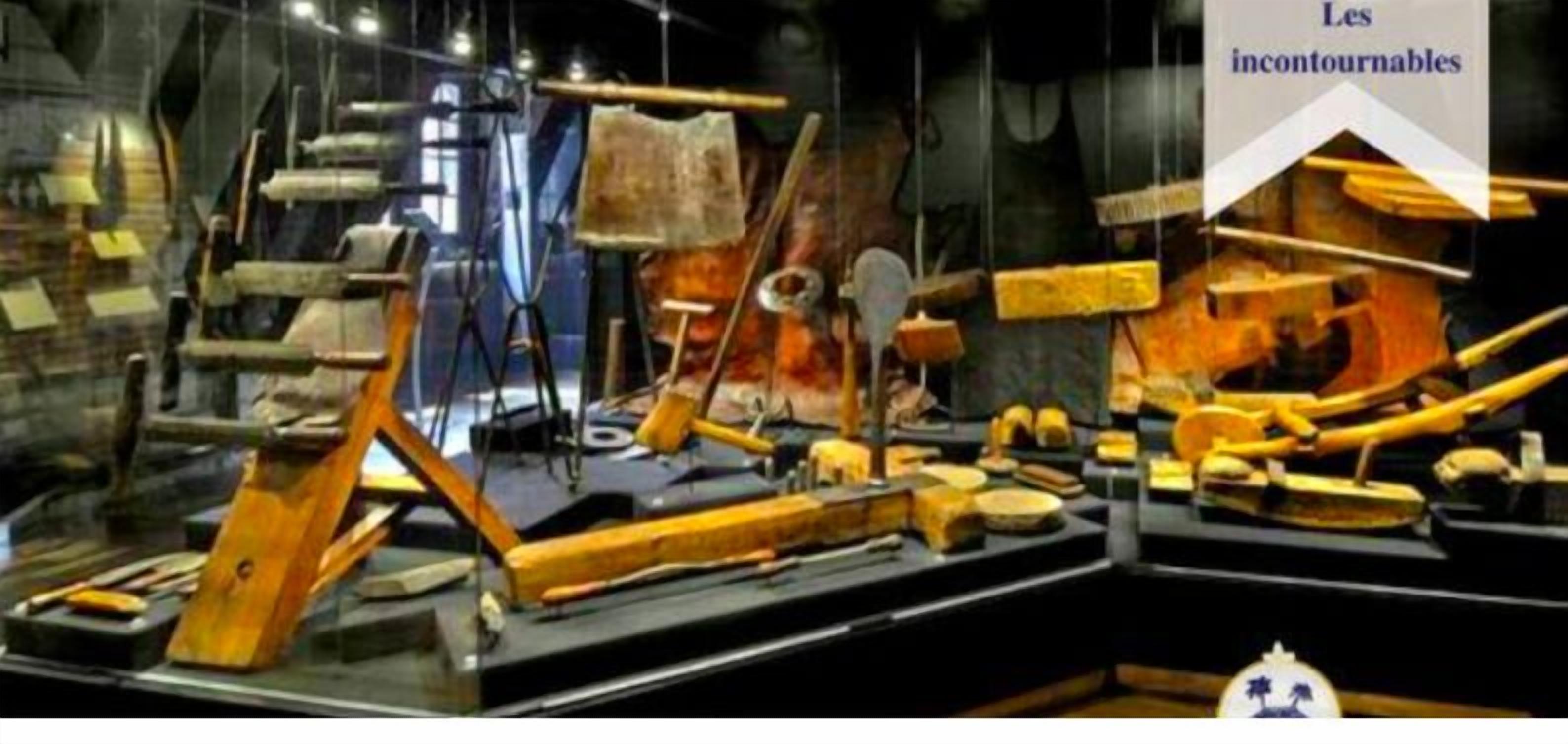 An exhibition of historical tools and artifacts in a museum setting.