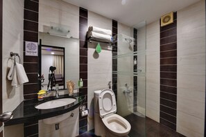 Shower, rainfall showerhead, hair dryer, slippers - Click Hotel Yuvraj (Surat)