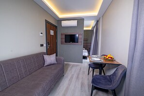 Habitación Deluxe | Minibar, wifi gratis, ropa de cama