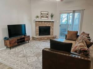 TV, fireplace - Spacious Poolside Oasis with Easy Access & Parking (Corpus Christi)