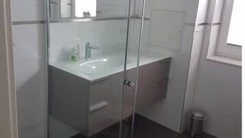 Ducha y secador de pelo