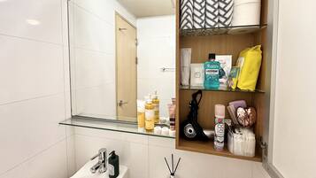 Jetted tub, hair dryer, towels, soap