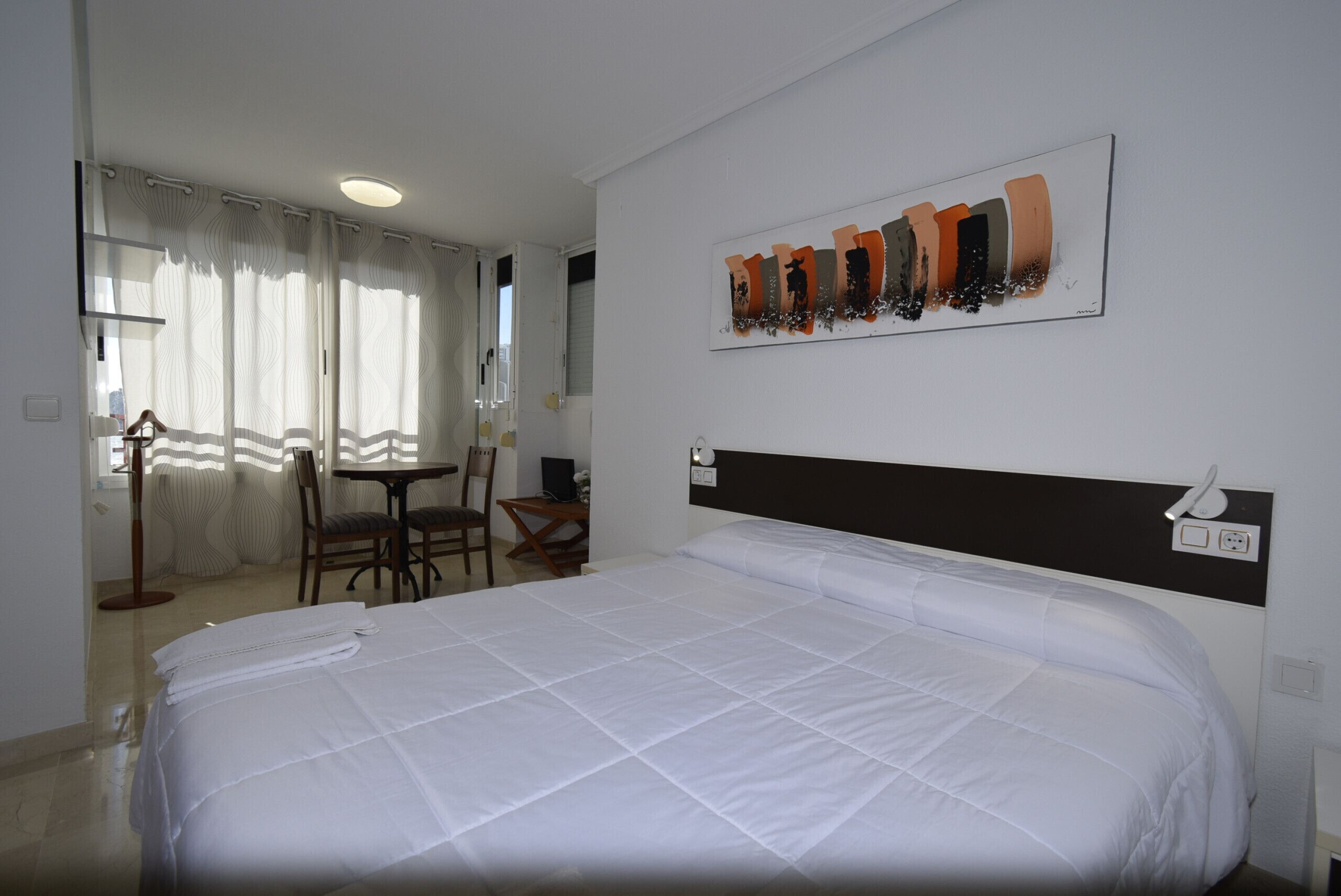 3 slaapkamers, een strijkplank/strijkijzer, beddengoed