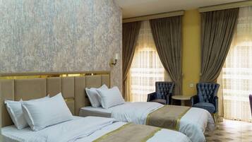 Kahden hengen deluxe-huone | Egyptinpuuvillaiset lakanat, ylelliset vuodevaatteet, minibaari