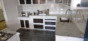 Fridge, microwave, stovetop, electric kettle