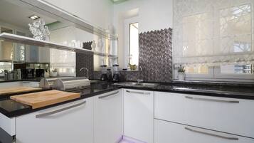 Apartment | Private kitchen | Fridge, microwave, oven, stovetop