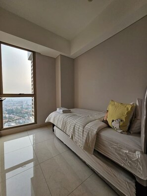 3 habitaciones, tabla de planchar con plancha, wifi y ropa de cama 