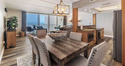 This oceanfront 2BR condo sits directly on the beach with a modern design, granite kitchen, and stunning views. Relax on the private balcony overlooking the pool and ocean, watch dolphins in the morning, or drive 70 minutes to Walt Disney World.