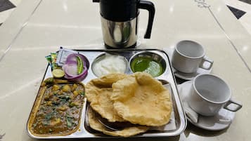 Daily cooked-to-order breakfast (INR 200 per person)