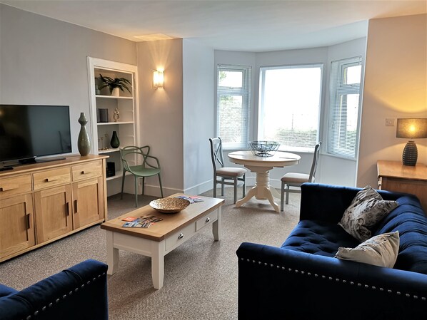 Apartamento | Zona de estar | Una televisión de pantalla plana