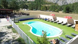 Seasonal outdoor pool, pool umbrellas, sun loungers
