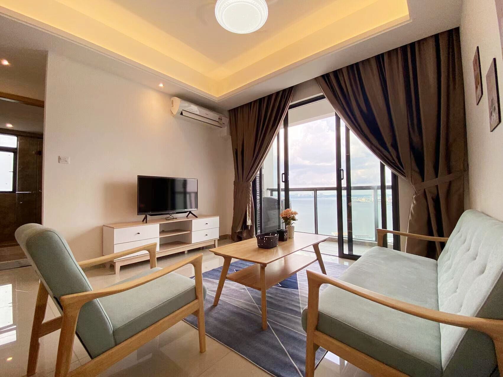 Appartement Luxe, 2 chambres, vue mer | Coin séjour