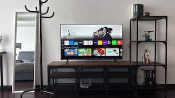 Comfort Apartment, 1 King Bed | Living area | 43-inch Smart TV with cable channels, Netflix, streaming services