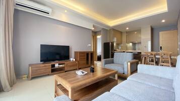 Luxury Apartment | Living area | 43-inch Smart TV with cable channels, Netflix, streaming services