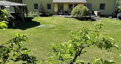 Vacation apartment at Düstersee with terrace and sauna in your own garden