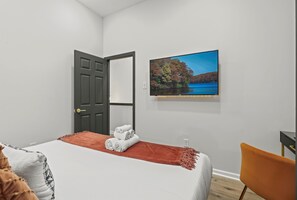 3 bedrooms, desk, iron/ironing board, travel cot