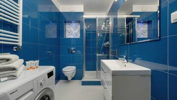 Shower, hair dryer, shampoo