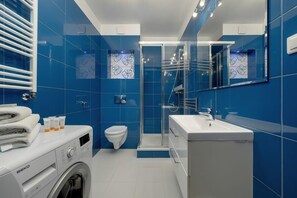 Shower, hair dryer, shampoo