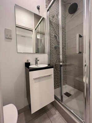 Shower, hair dryer - Modern 2BR Apartment Just Off Main Street (Gibraltar)