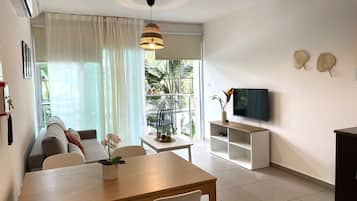 Oneiro Holiday Apt DPS101 | Living area | 43-inch Smart TV with digital channels