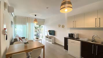 Oneiro Holiday Apt DPS101 | Living area | 43-inch Smart TV with digital channels