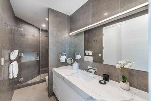 Hair dryer, towels, soap, shampoo