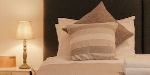 Premium bedding, memory-foam beds, soundproofing, free WiFi