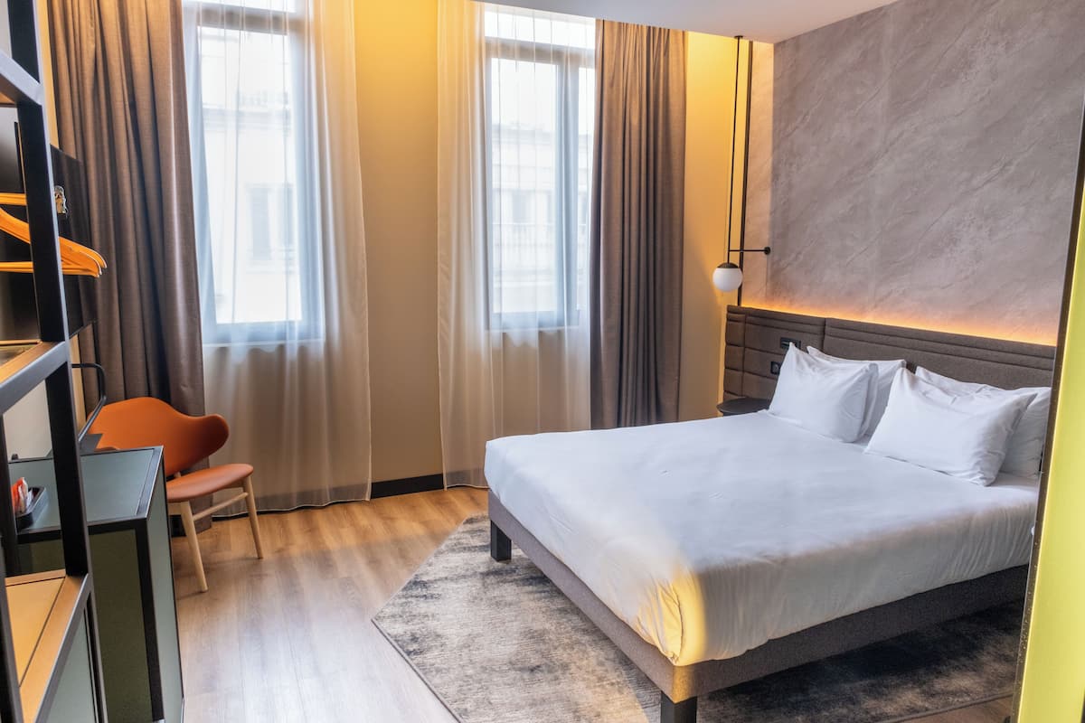 Luxe beddengoed, bedden met traagschuimmatras, een minibar