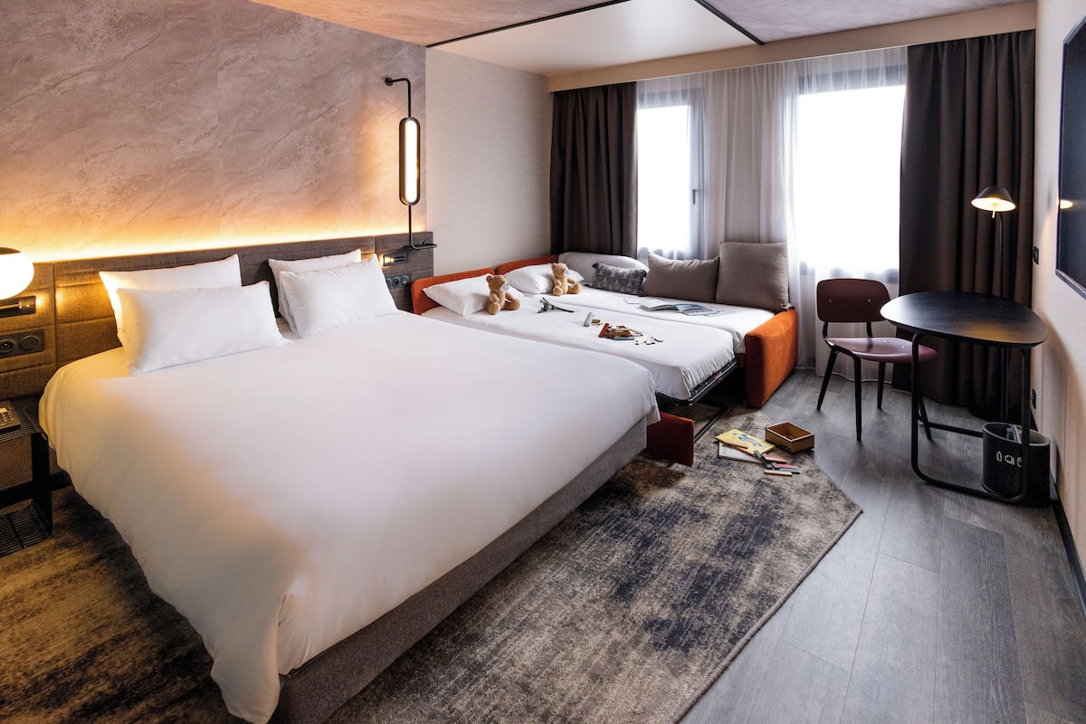 Luxe beddengoed, bedden met traagschuimmatras, een minibar