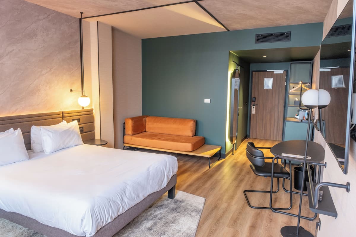 Luxe beddengoed, bedden met traagschuimmatras, een minibar