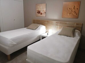 2 habitaciones, tabla de planchar con plancha y wifi gratis 