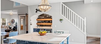 Happy Hour is a 5-bedroom, 5-bathroom canal front home with dock, pet friendly!