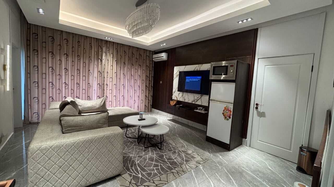 Executive Apartment | Living area | Fireplace