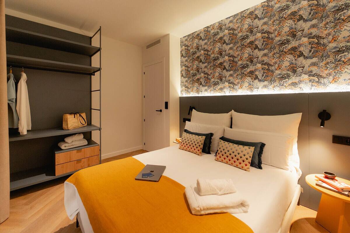 Apartment, 1 Bedroom, Ocean View | In-room safe, laptop workspace, soundproofing, iron/ironing board