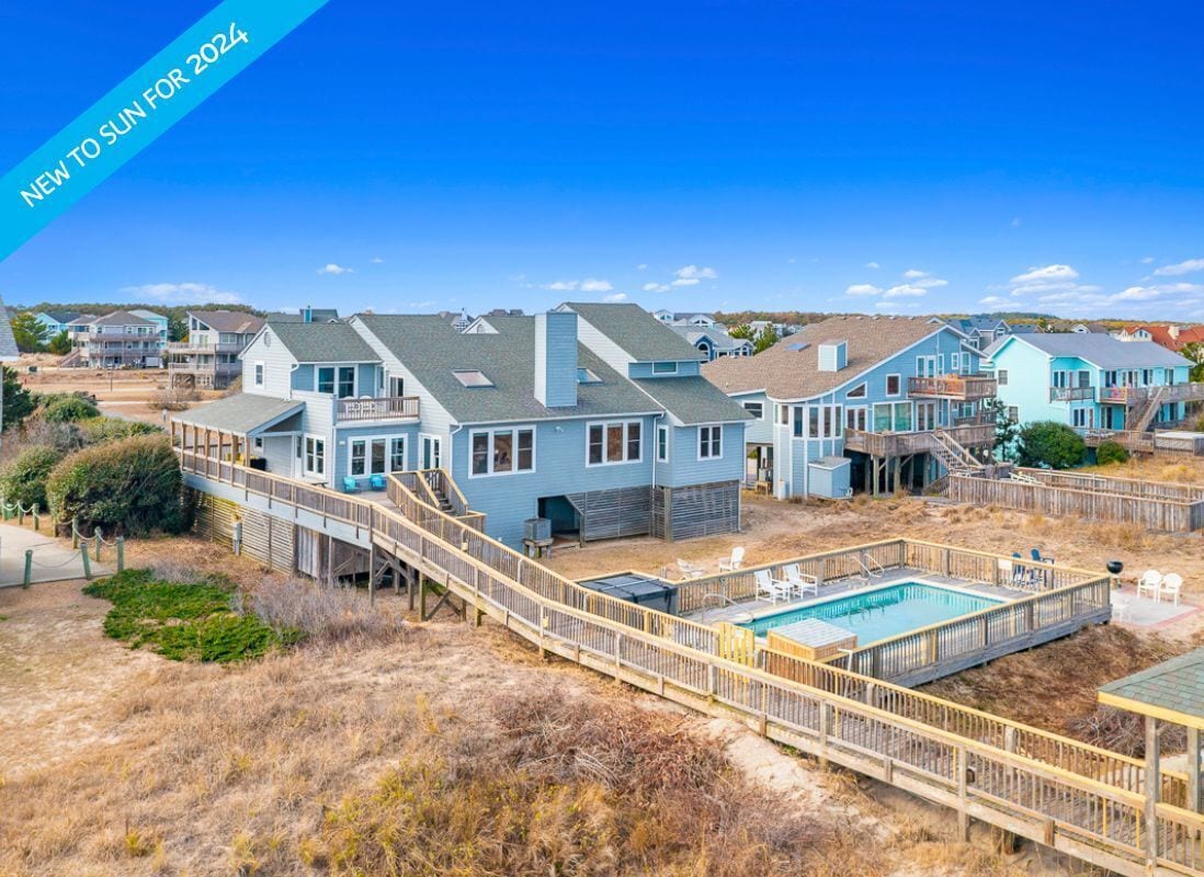 Private boardwalk right to the beach from Oceanfront OBX 02!