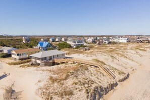 Exterior - Oceanfront home, steps from the sand and front row seats to gorgeous sunrises (South Nags Head)