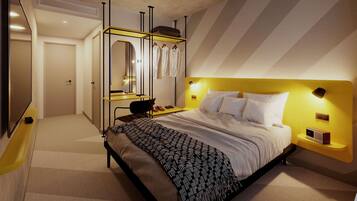 Une chambre à coucher moderne avec un lit, une coiffeuse avec un miroir et un téléviseur.