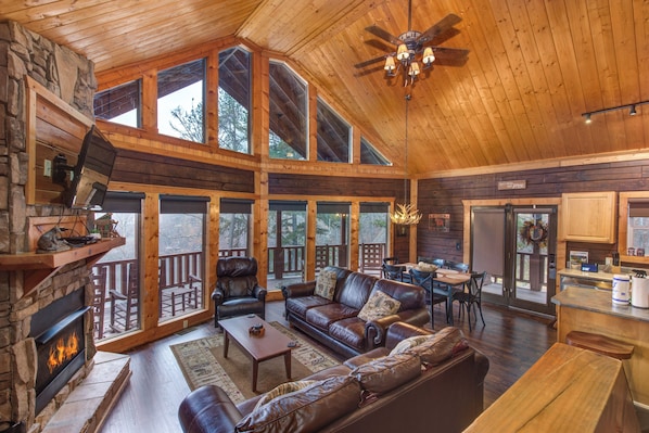 Cabin, Multiple Beds, Pool Access | Living area | 42-inch flat-screen TV with digital channels, TV, fireplace - Down by the Water (Sevierville)
