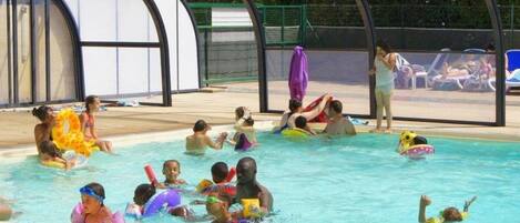 Alberca techada y alberca climatizada