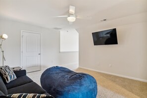 Smart TV, ping pong, books, offices
