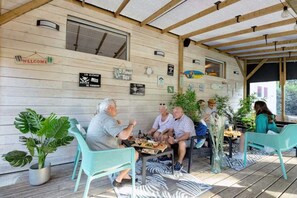 Relax in a welcoming outdoor space with comfortable seating and social areas.