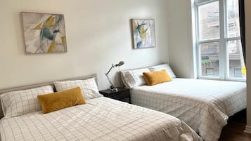 Family Apartment, 3 Bedrooms, Balcony | Individually decorated, individually furnished, laptop workspace