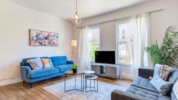 Apartment, 2 Bedrooms | Living area | 32-inch TV with digital channels