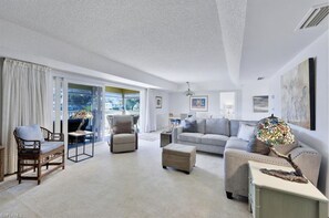 Living area - Superior Views, Golf, Pickleball & More! Beautiful 2-bedroom condo in Naples! (Naples)