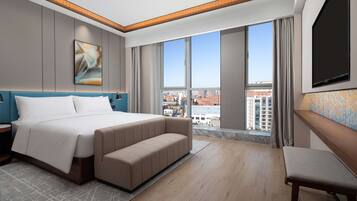 Deluxe Suite, 1 King Bed | Premium bedding, down duvets, pillow-top beds, in-room safe