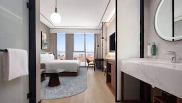 Premium bedding, down comforters, pillowtop beds, in-room safe